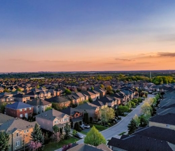 Panoramic view of houses in the suburbs during the sunset.